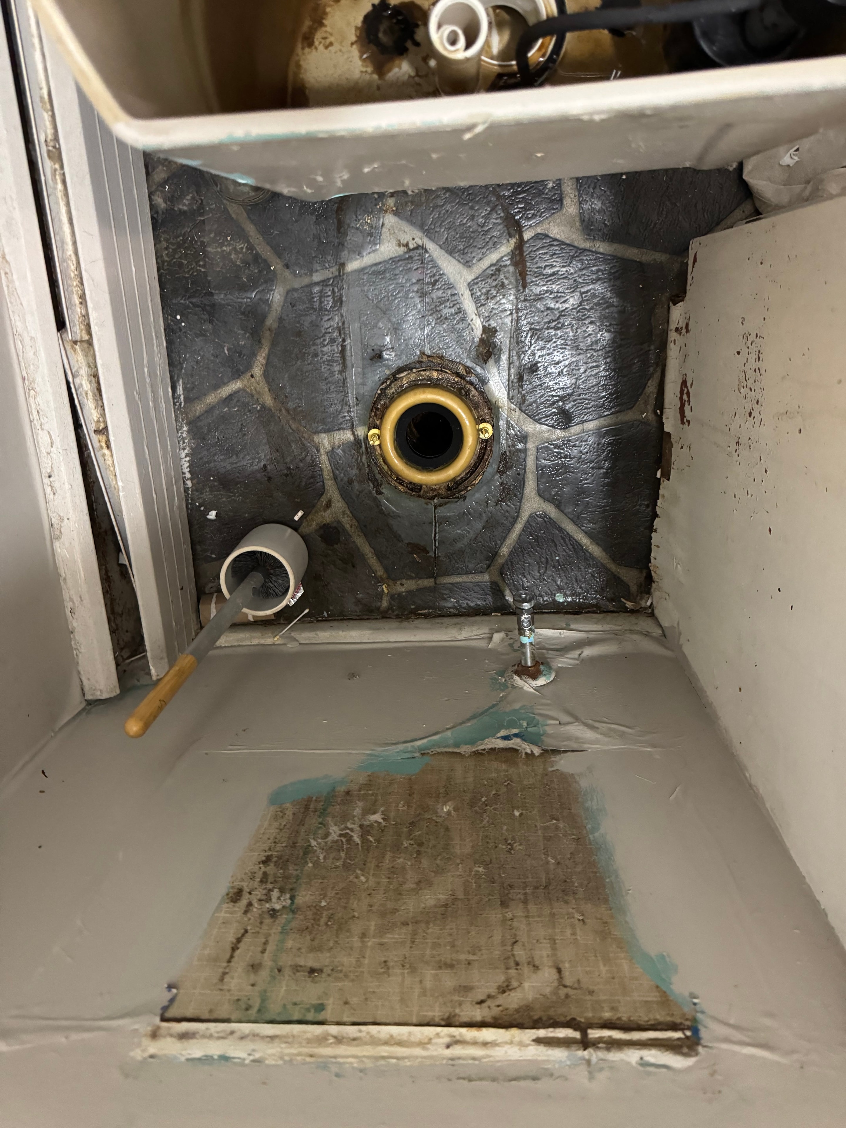 Toilet tank plumbing repair