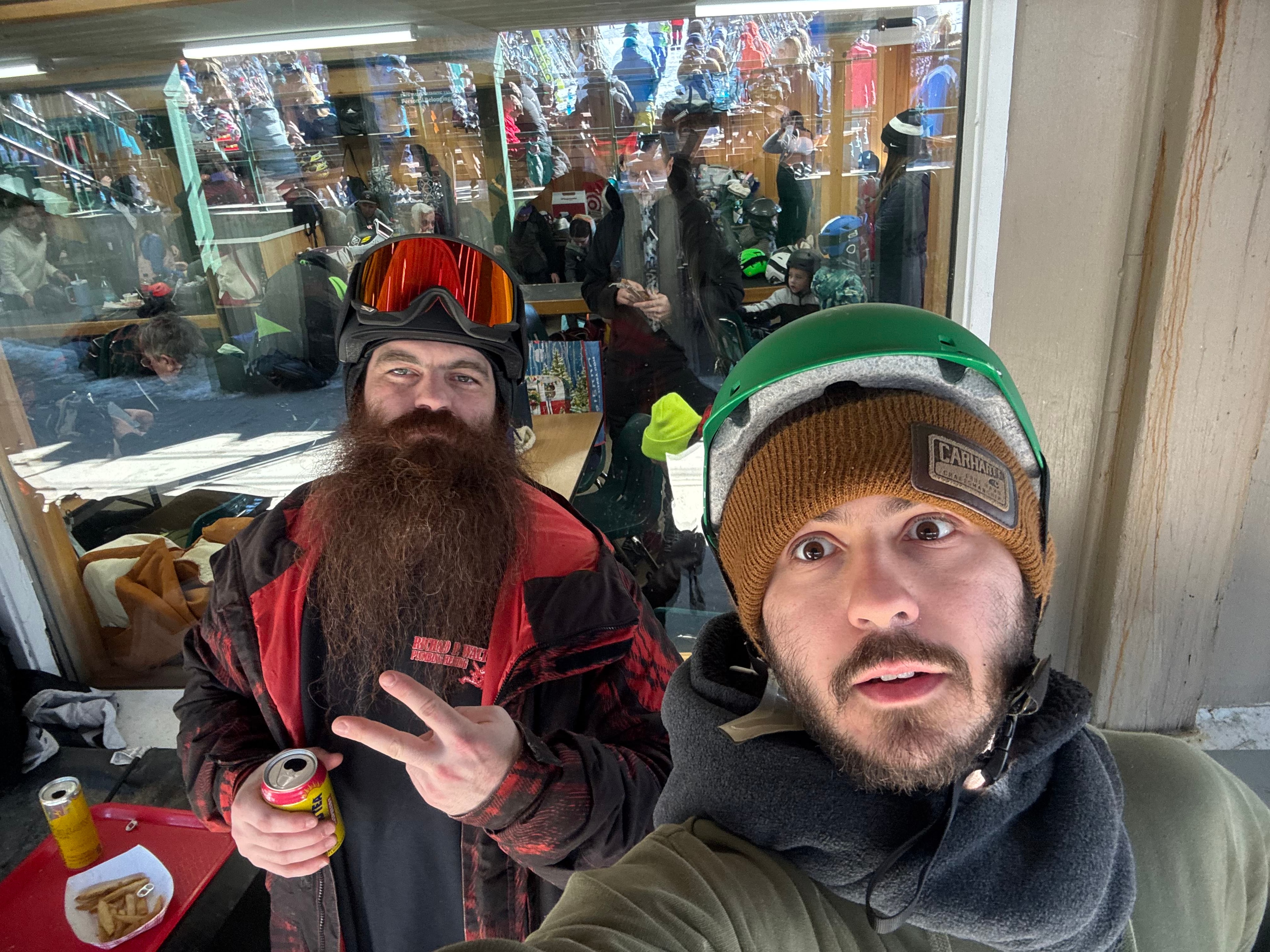 Friends snowboarding at the mountain